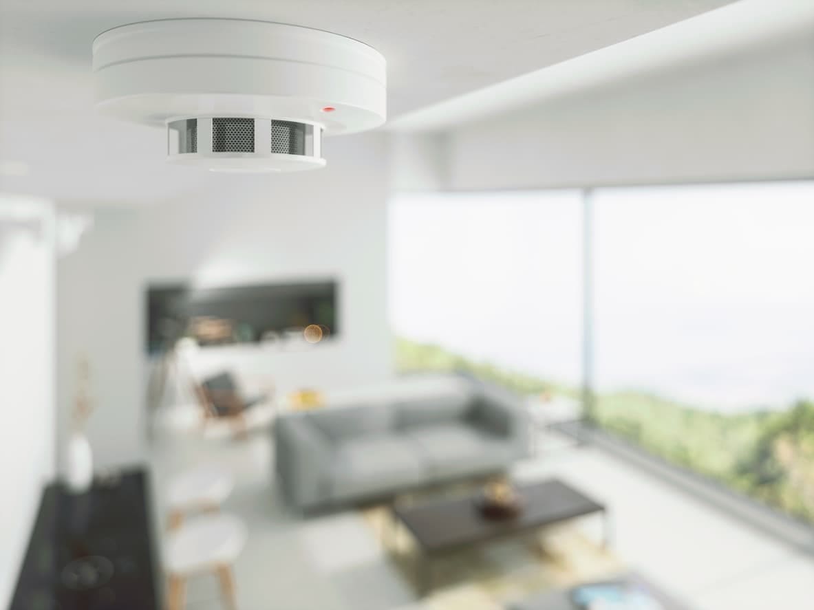 Photo of a modern apartment with a focus on a fire sprinkler system head