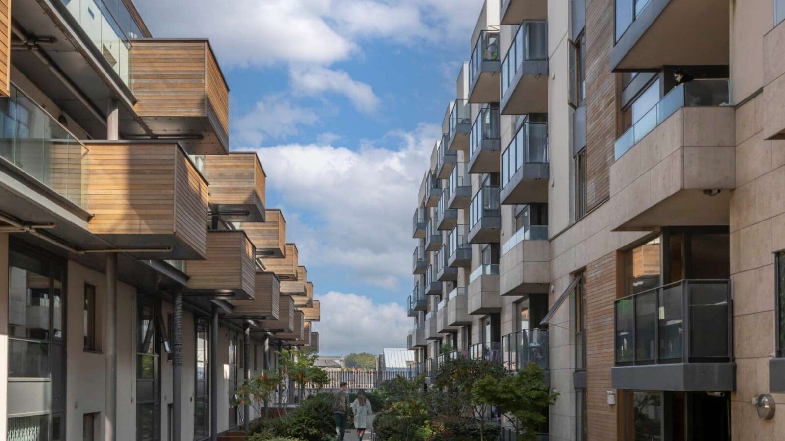 Photo of 2 blocks of apartments.